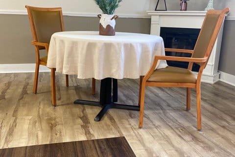 Interior common area with a round table and chairs