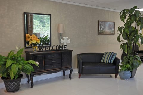 Welcoming common area with plants and decor