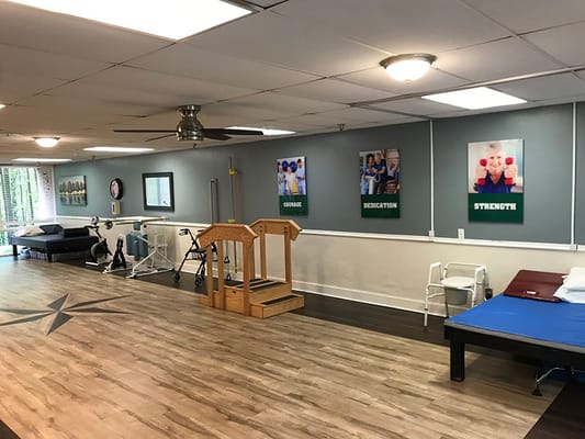Activity area with therapy equipment and motivational posters