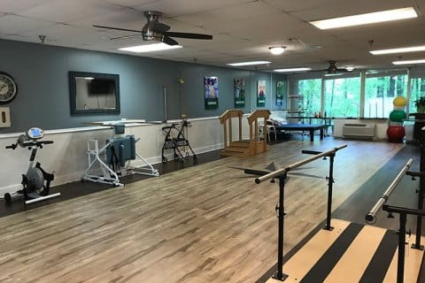 Rehabilitation gym with equipment and exercise area
