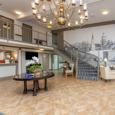 Interior lobby area with chandelier and seating