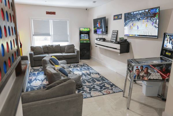 Activity room with games and seating area