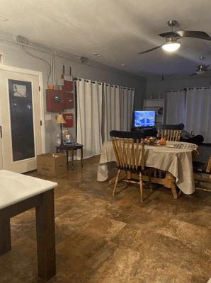 Common area with dining table and seating