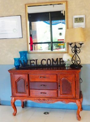 Interior entrance with a welcome sign and decor