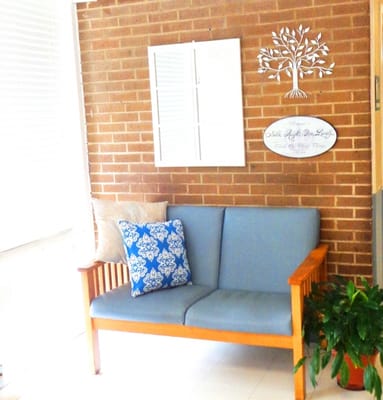 Cozy sitting area with couch and decorative accents