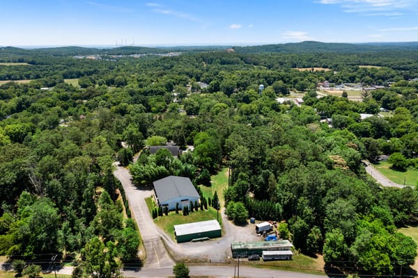 Aerial view of Kingston Wellness Retreat surrounded by greenery