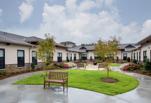 Beautiful landscaped courtyard with benches and flowers