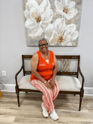 Resident smiling in a common area