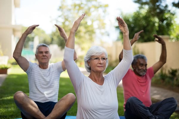 Residents participating in outdoor exercise class