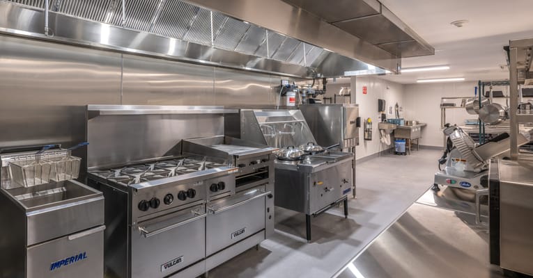 Well-equipped stainless steel kitchen in a senior living facility