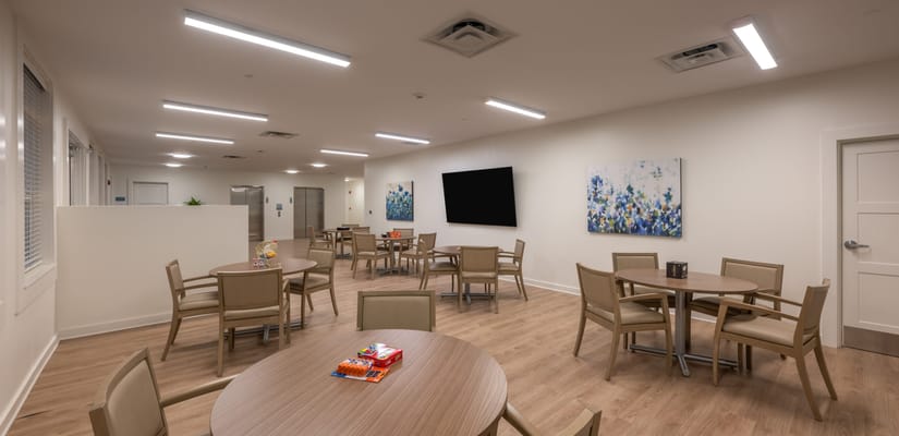 Bright dining area with tables and chairs