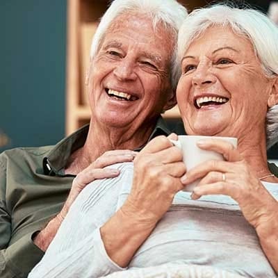 Senior couple enjoying time together with a coffee