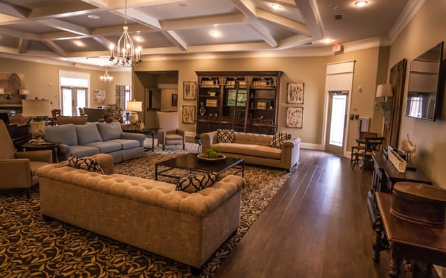 Bright common area with sofas and decor