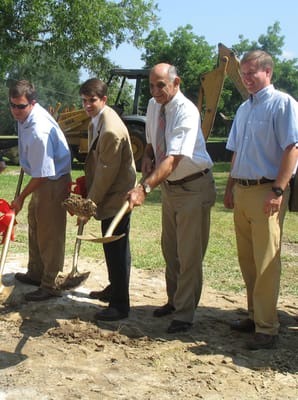 Groundbreaking ceremony with smiling participants