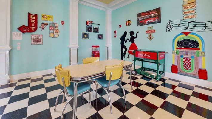 Colorful diner-themed common area with a vintage vibe