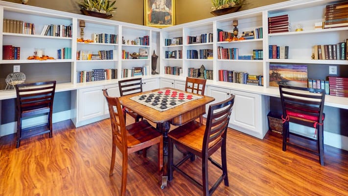 Cozy common area with shelves filled with books