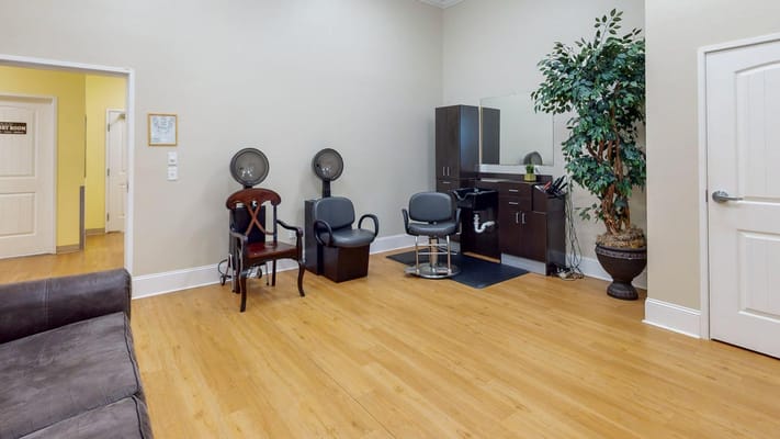Interior view of a hair salon area in the facility