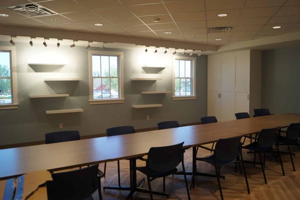 Interior view of a meeting room with seating