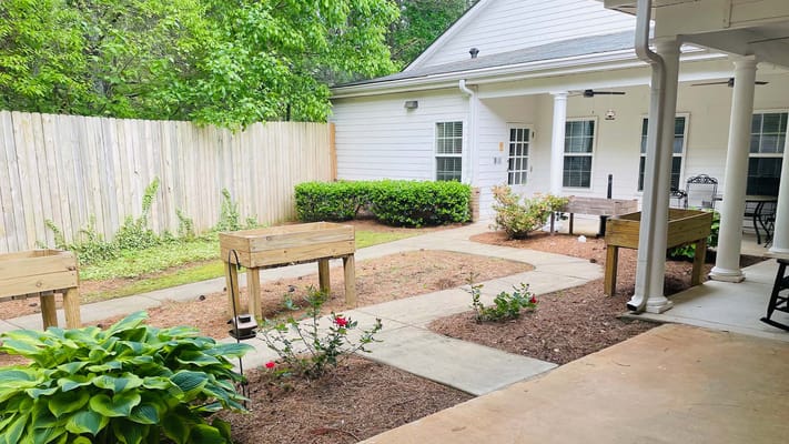 A garden area of Cedarhurst of Oakwood with raised beds