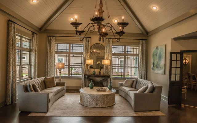 Cozy lounge area with comfortable seating and large windows