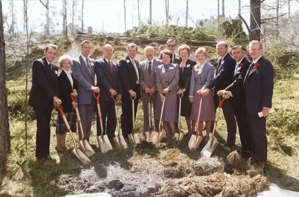 Groundbreaking ceremony with group holding shovels