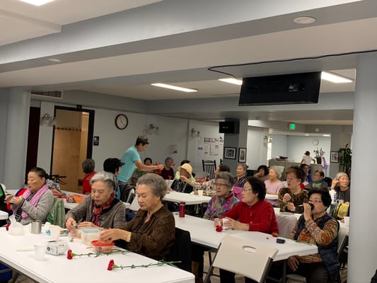 Residents engaged in a group activity in a common area