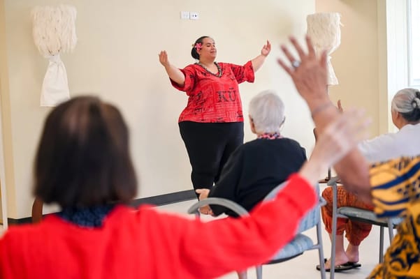 Engaging activity session with facilitator and residents