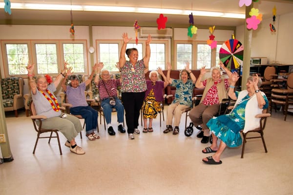 Residents participating in a lively group activity session