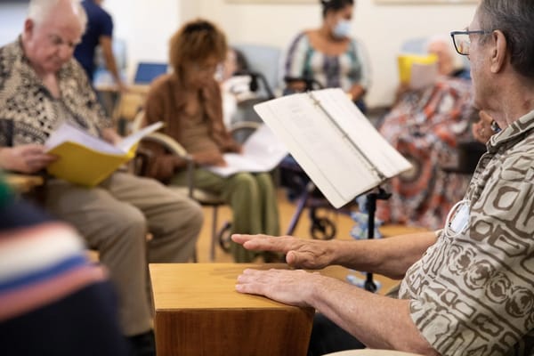 Residents participating in a music activity session