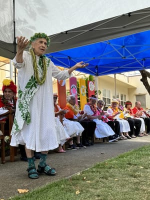 Residents and staff participating in an outdoor activity celebration