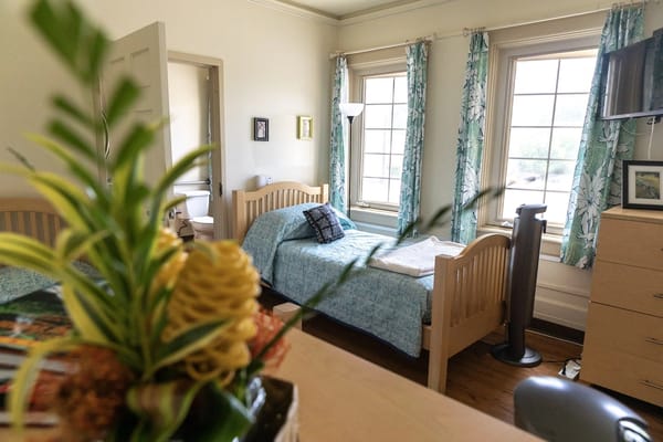 A cozy interior view of a shared resident room