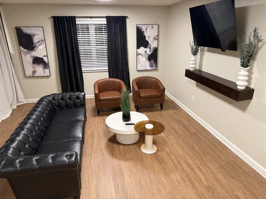 Bright common area with stylish seating and decor