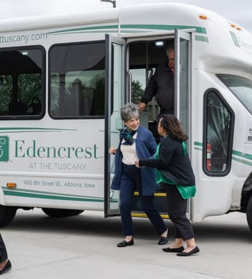 Residents boarding a facility transport van