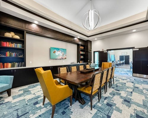 Interior dining area with wooden table and chairs