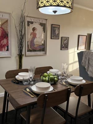 Dining area setup with plates and decor