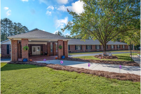 Exterior view of Haven Memory Care with landscaping