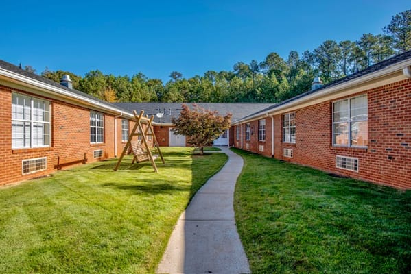 Pathway leading through a landscaped outdoor area