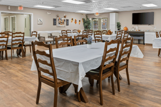 Dining area with tables set for meals
