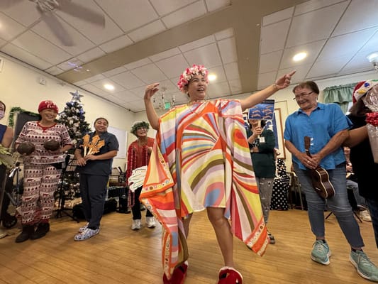 Residents participating in an activity in a community room
