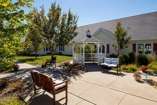 Outdoor seating area with gazebo and benches