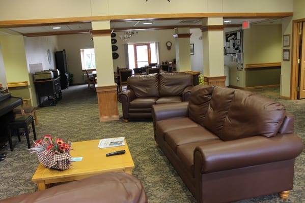 Common area with seating and tables in the facility