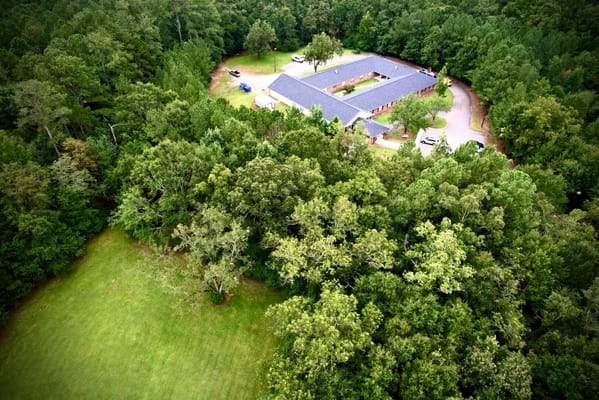 Aerial view of Haven Memory Care surrounded by trees