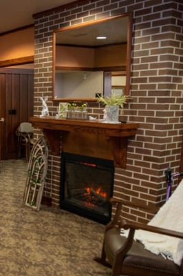 Cozy common area with a fireplace and decor