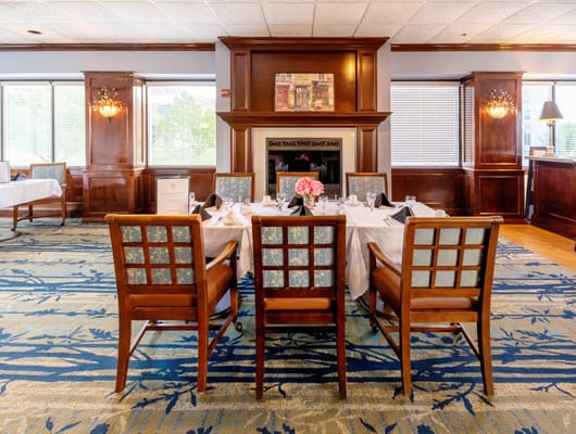 Elegant dining room setup with floral centerpiece