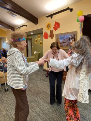 Residents engaging in a fun activity in a common area