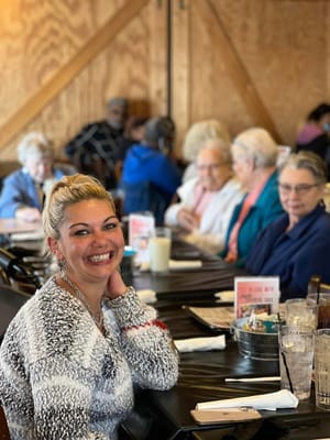 Residents enjoying a meal in a dining area