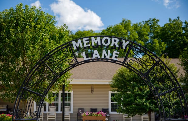 Welcome archway labeled 'Memory Lane' at the facility entrance