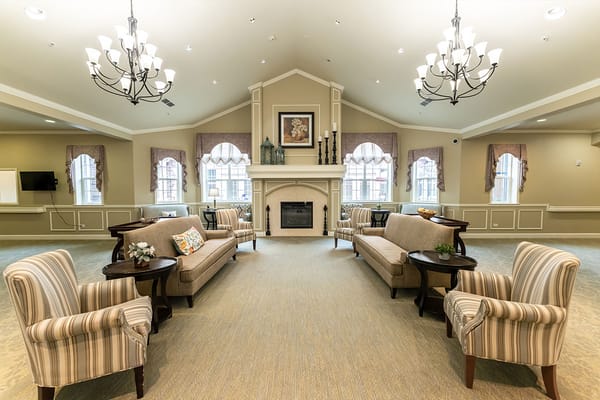 Common area with seating and fireplace