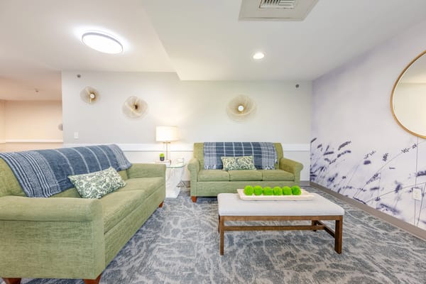 Cozy lounge area with comfortable seating and decor