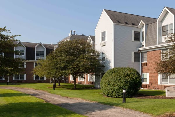 Pathway through landscaped outdoor space of the facility